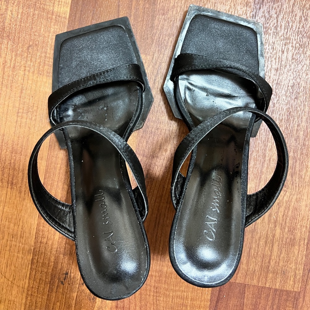 Black heeled sandals, slippers